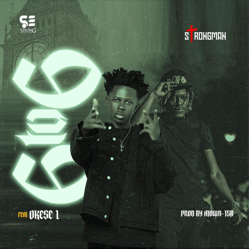 Ghanaian musician Okese1 performs his hit song "Strongman 6 to 6 Ft" on stage, wearing stylish urban fashion, surrounded by flashing lights and cheering fans, expressing intense emotion and energy through his dynamic gestures and facial expressions.